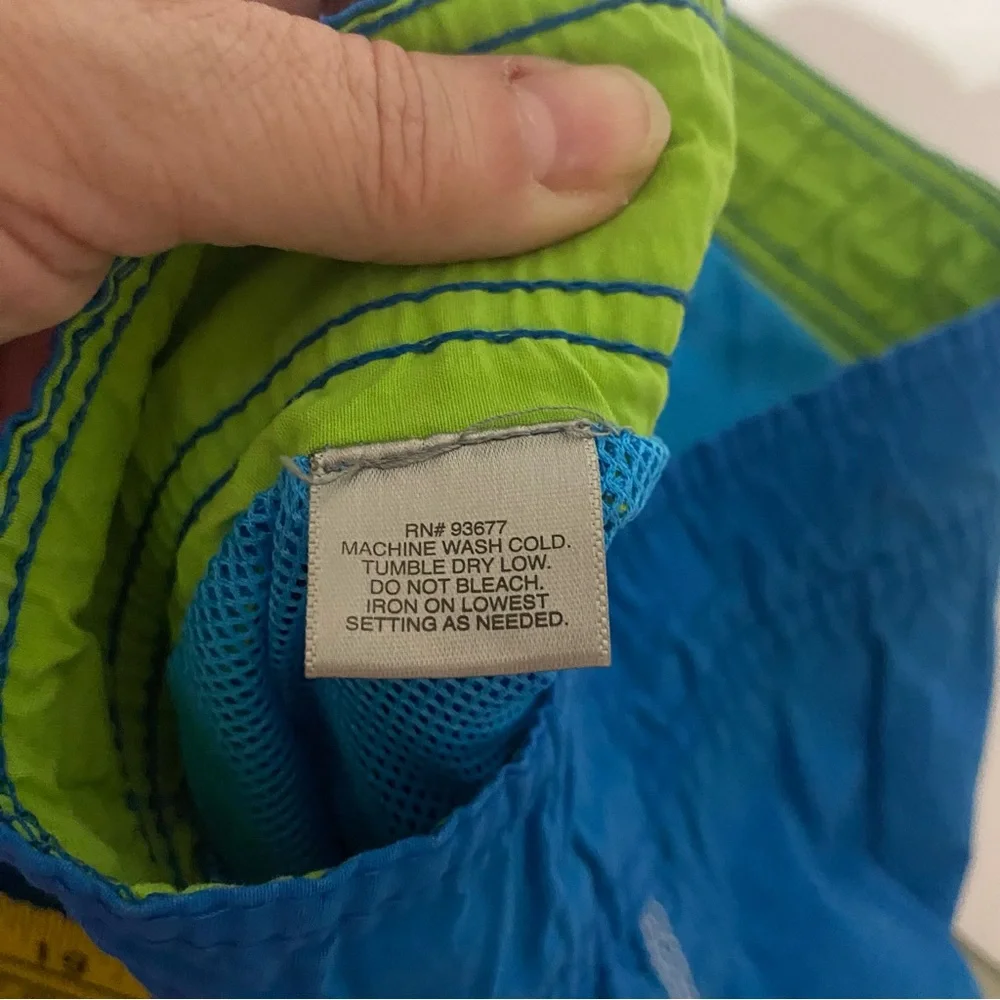 Men’s The Foundry Supply Co blue with green swim trunks. 3XL